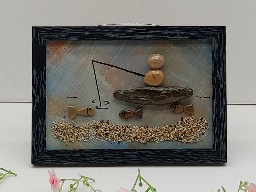 Pêcheur en barque sur la rivière